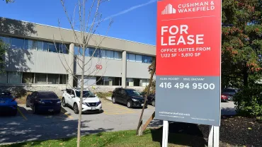 1631px-CushmanWakefieldSign2-jpg.webp