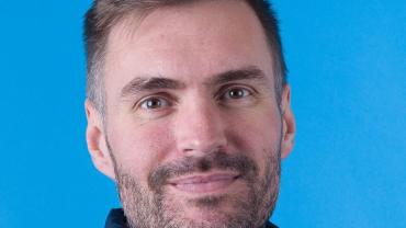 Andrew-Hulbert-Profile-e1753429275692.jpg