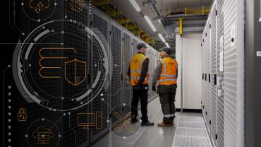 two-engineers-standing-in-data-centre-2.jpg