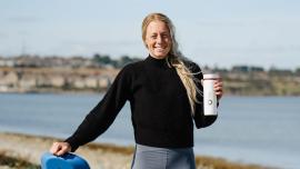 Ellie-Aldridge-with-board-and-bottle.jpg