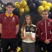 2.-Faye-Oxley-receiving-her-awards-with-BCFC-players-Zac-Hadi-and-Lewis-Richards-e1747842991769.jpg