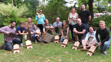 Roy Underhill, centre, with a group of students and their book stands made to a design by Thomas Jefferson.