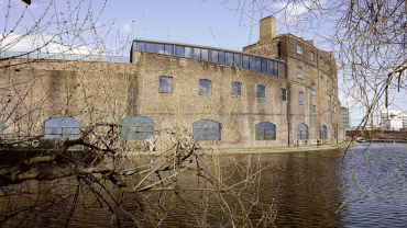 The canalside Fish and Coal Buildings in London's newly fashionable Kings Cross district. (Photography by David Morley Architects).