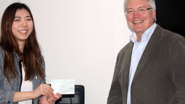 Bright spark: Jimin Jeonand after being presented with her prize by LIA CEO, Steve Davies.