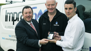 (Left to right) Martin Port, CEO at BigChange with an Impra-Gas technician and BBC Apprentice Winner Joseph Valente, Founder of ImpraGas.