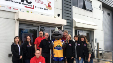 The Birstall team with Ronnie the Rhino – the Leeds Rhinos’ mascot.