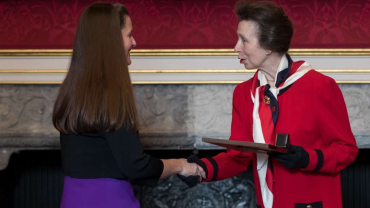 HRH, The Princess Royal, presenting Jacquie Smart with her Butler Trust Awards certificate.