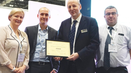 Award presentation – Lord Rupert Redesdale, Chairman of the Energy Managers Association. From Aspire Defence Services Limited (left to right) –  Debbie Bennett,  Mitchel Maynard and David Cottage.