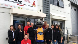 The Birstall team with Ronnie the Rhino – the Leeds Rhinos’ mascot.