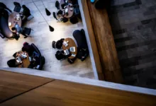 aerial photography of people sitting on chair