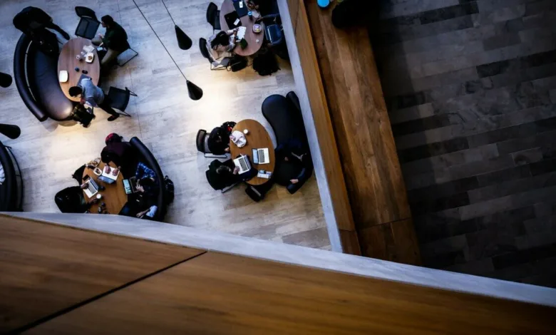 aerial photography of people sitting on chair